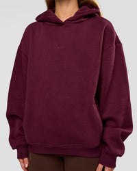 Woman wearing Go-To Oversized Hoodie - Cherry Lacquer | Model:Issy | Size:XS | Thumbnail Index: 5