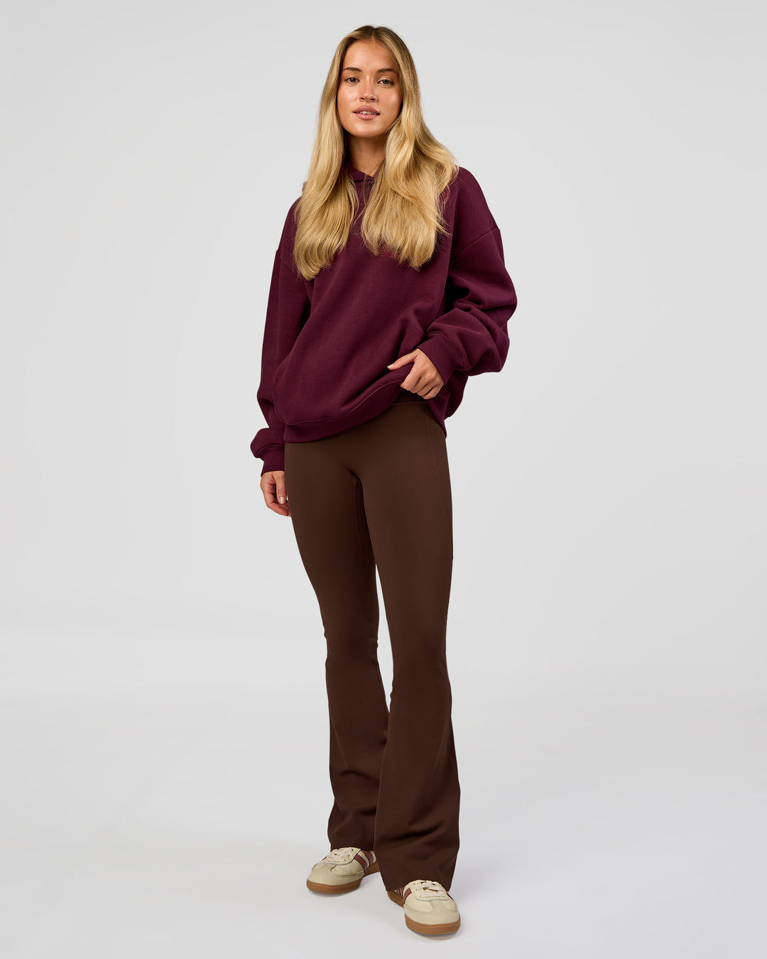 Woman wearing Go-To Oversized Hoodie - Cherry Lacquer | Model:Issy | Size:XS - view 3