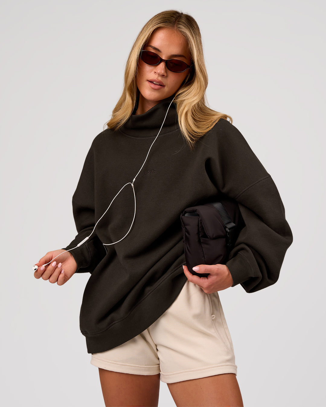 Woman wearing Go-To Oversized Mock Neck Sweater - Ground Coffee | Model:Issy | Size:XS - view 1