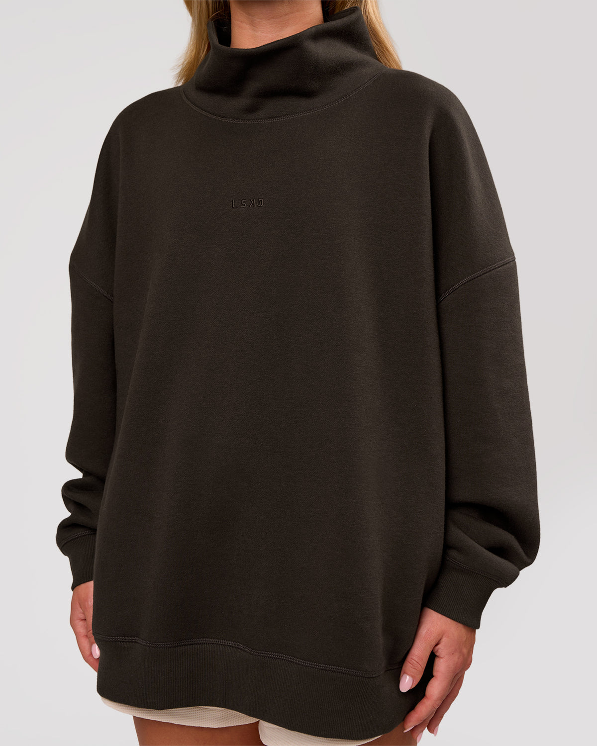 Woman wearing Go-To Oversized Mock Neck Sweater - Ground Coffee | Model:Issy | Size:XS