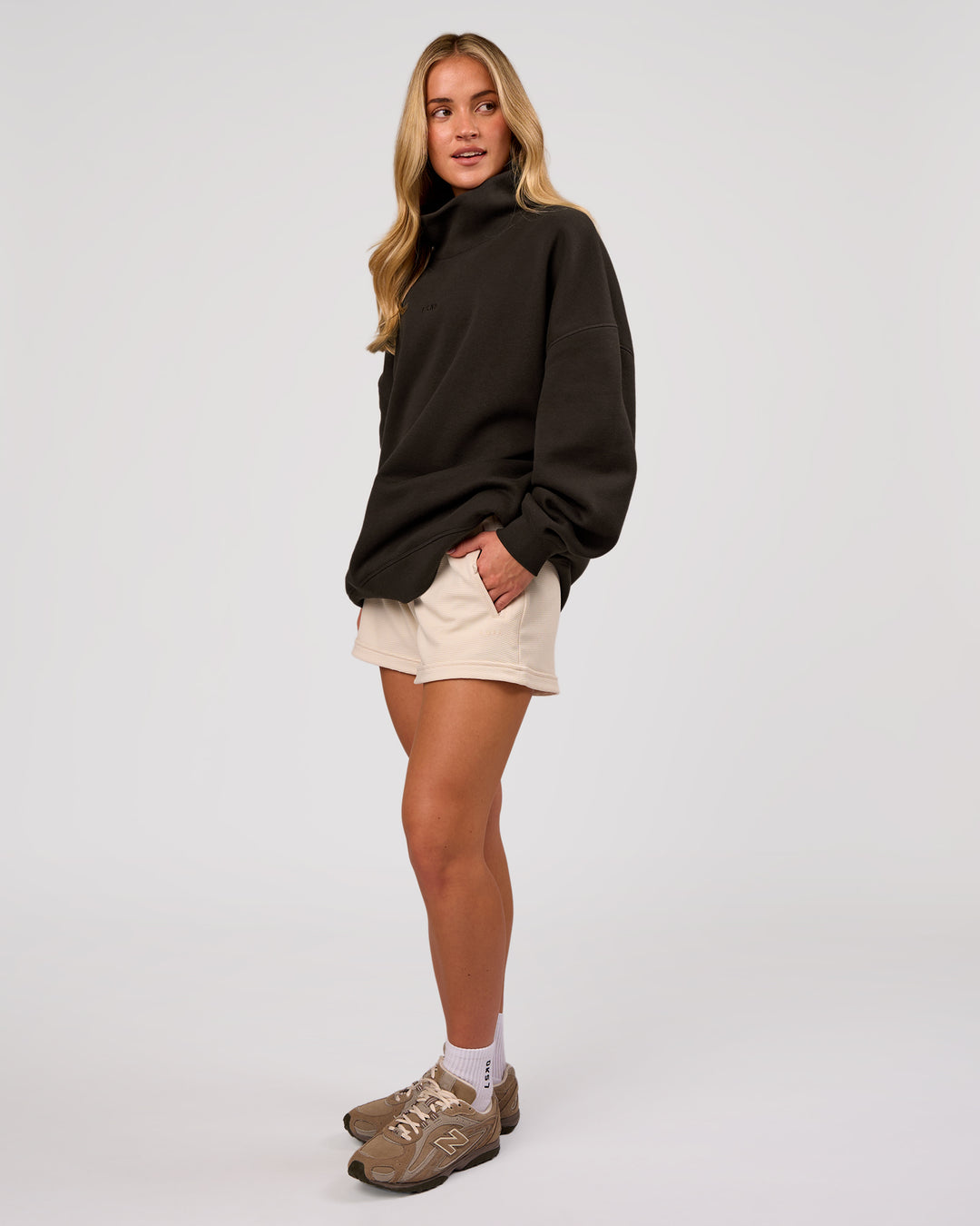 Woman wearing Go-To Oversized Mock Neck Sweater - Ground Coffee | Model:Issy | Size:XS - view 7