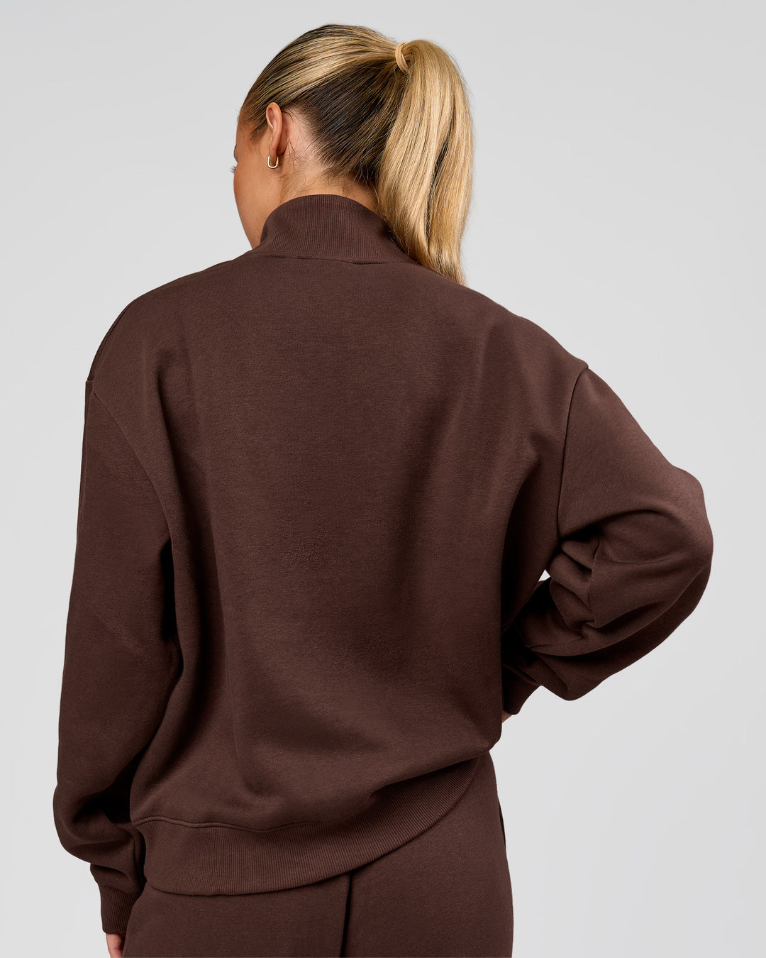 Woman wearing Go-To Oversized Quarter Zip Sweater - Hot Chocolate | Model:Issy | Size:XS - view 2
