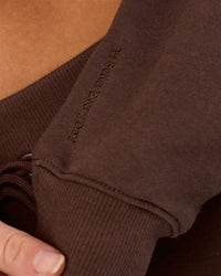 Woman wearing Go-To Oversized Quarter Zip Sweater - Hot Chocolate | Model:Issy | Size:XS | Thumbnail Index: 7