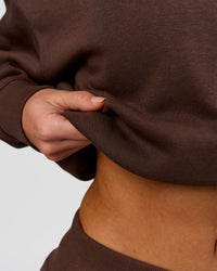 Woman wearing Go-To Oversized Quarter Zip Sweater - Hot Chocolate | Model:Issy | Size:XS | Thumbnail Index: 9