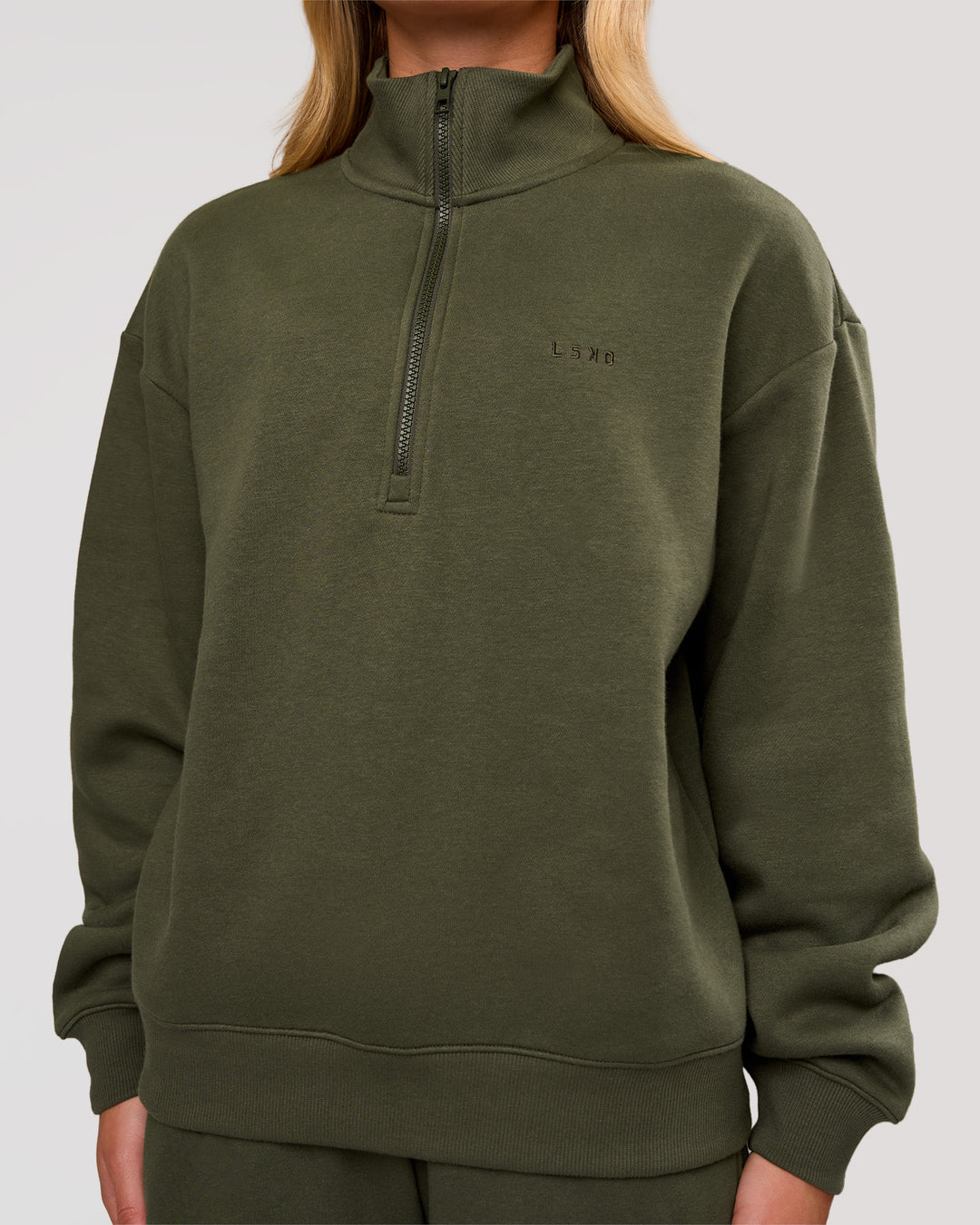 Woman wearing Go-To Oversized Quarter Zip Sweater - Pure Olive | Model:Issy | Size:XS - view 2