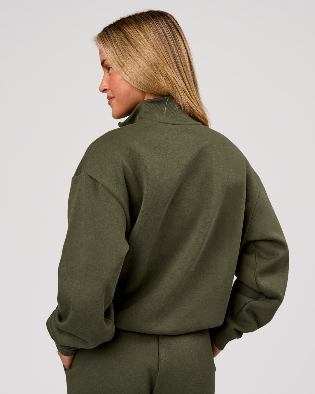 Woman wearing Go-To Oversized Quarter Zip Sweater - Pure Olive | Model:Issy | Size:XS - view 3