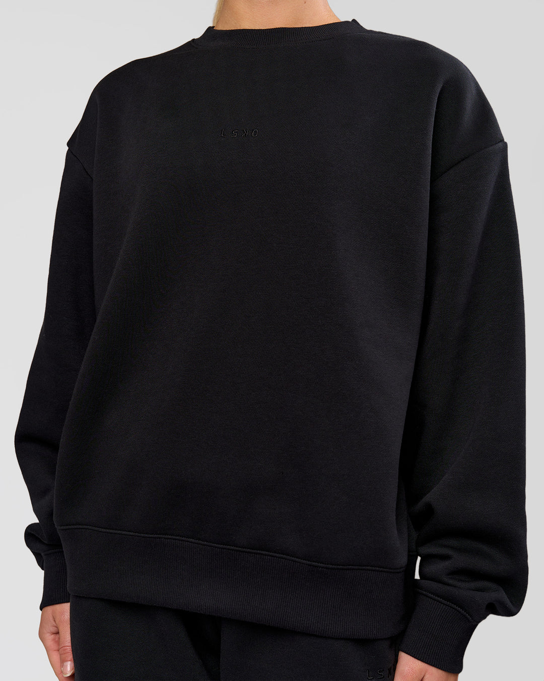 Woman wearing Go-To Oversized Sweater - Black | Model:Issy | Size:XS - view 5