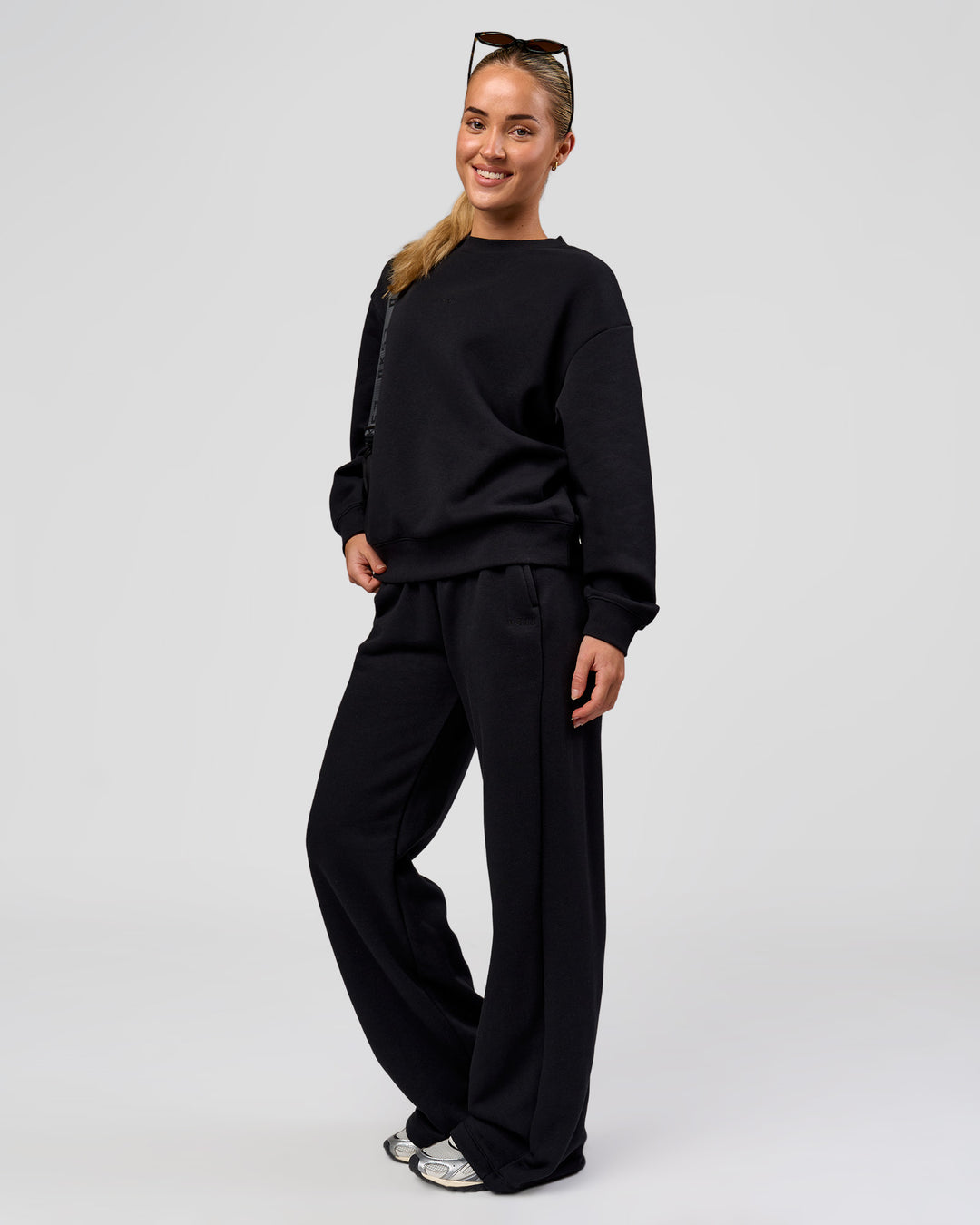 Woman wearing Go-To Oversized Sweater - Black | Model:Issy | Size:XS - view 6