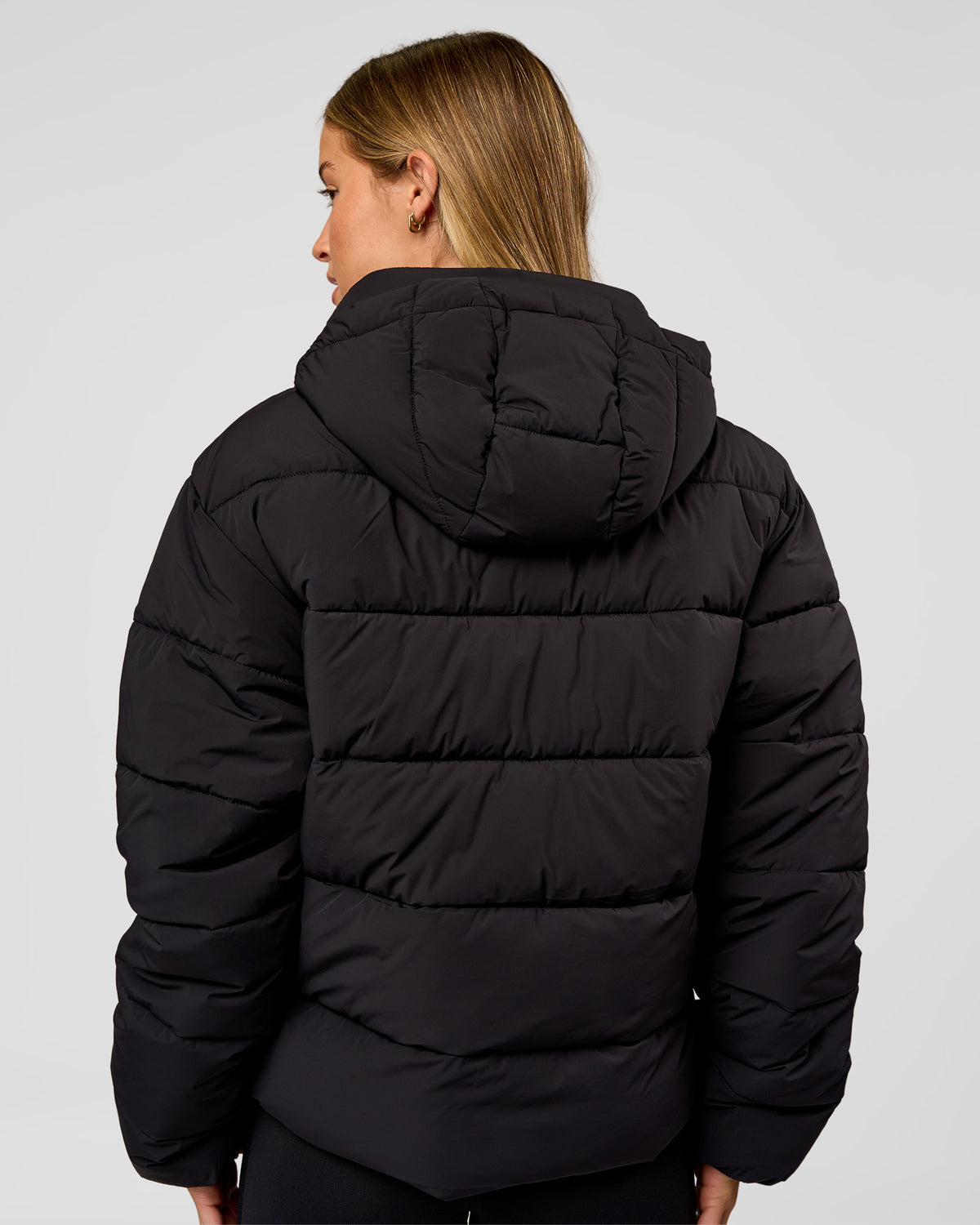 Woman wearing Go-To Puffer Jacket - Black | Model:Issy | Size:XS