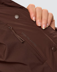 Woman wearing Go-To Puffer Jacket - Hot Chocolate | Model:Issy | Size:XS | Thumbnail Index: 9