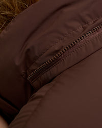 Woman wearing Go-To Puffer Jacket - Hot Chocolate | Model:Issy | Size:XS | Thumbnail Index: 11