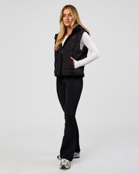 Woman wearing Go-To Puffer Vest - Black | Model:Issy | Size:XS | Thumbnail Index: 3
