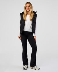 Woman wearing Go-To Puffer Vest - Black | Model:Issy | Size:XS | Thumbnail Index: 5