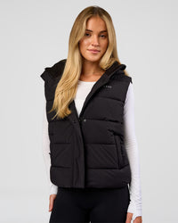 Woman wearing Go-To Puffer Vest - Black | Model:Issy | Size:XS | Thumbnail Index: 0
