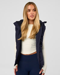 Woman wearing Go-To Puffer Vest - Future Navy | Model:Issy | Size:XS | Thumbnail Index: 3