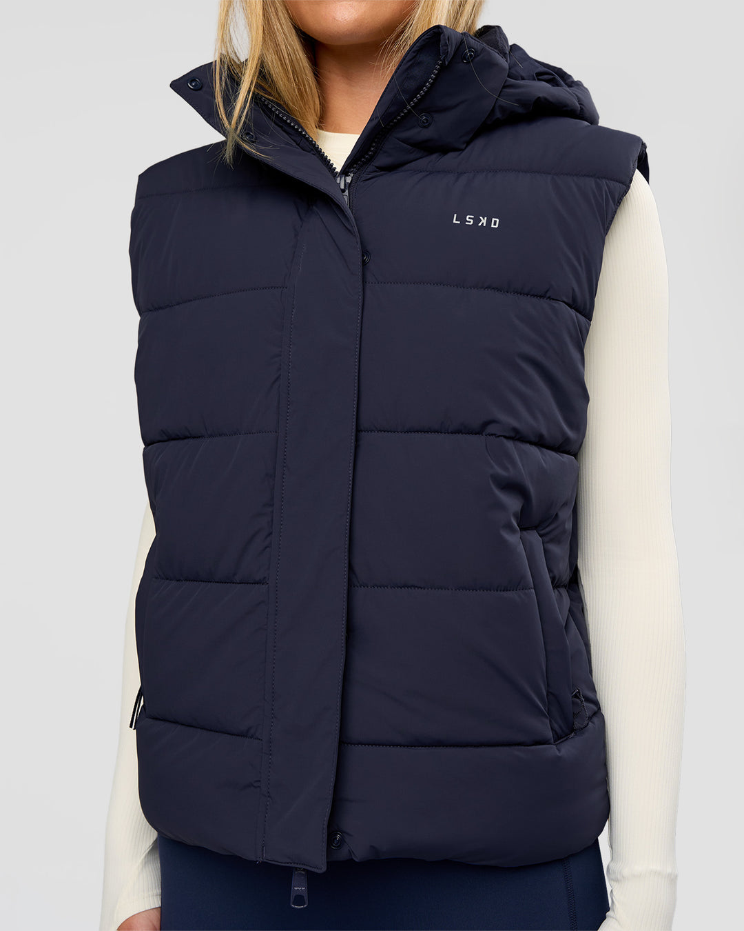 Woman wearing Go-To Puffer Vest - Future Navy | Model:Issy | Size:XS - view 5