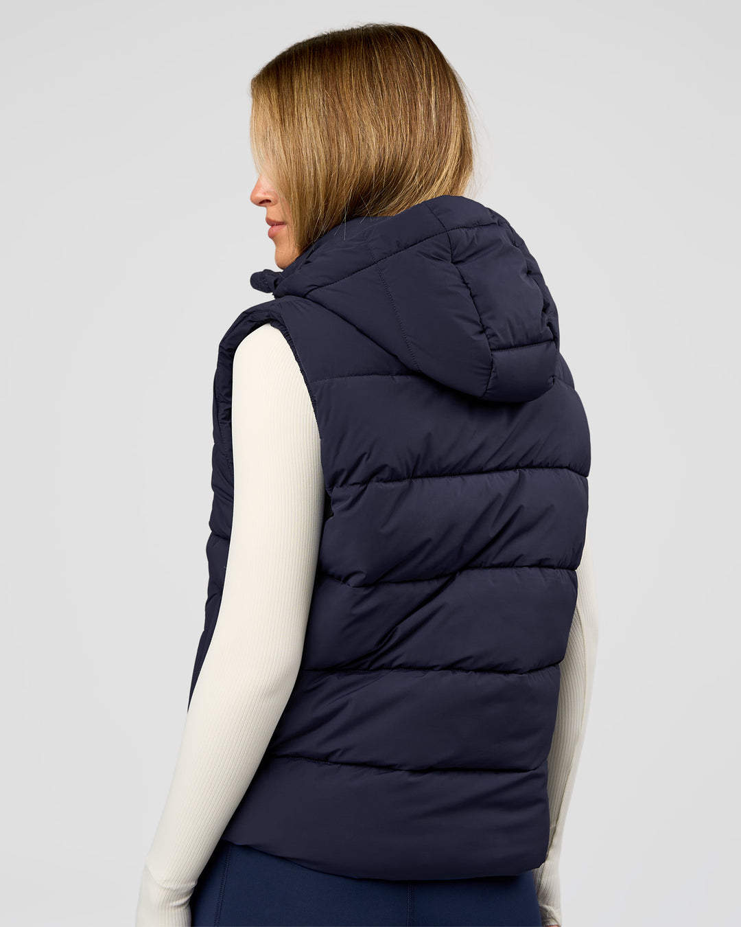 Woman wearing Go-To Puffer Vest - Future Navy | Model:Issy | Size:XS - view 6