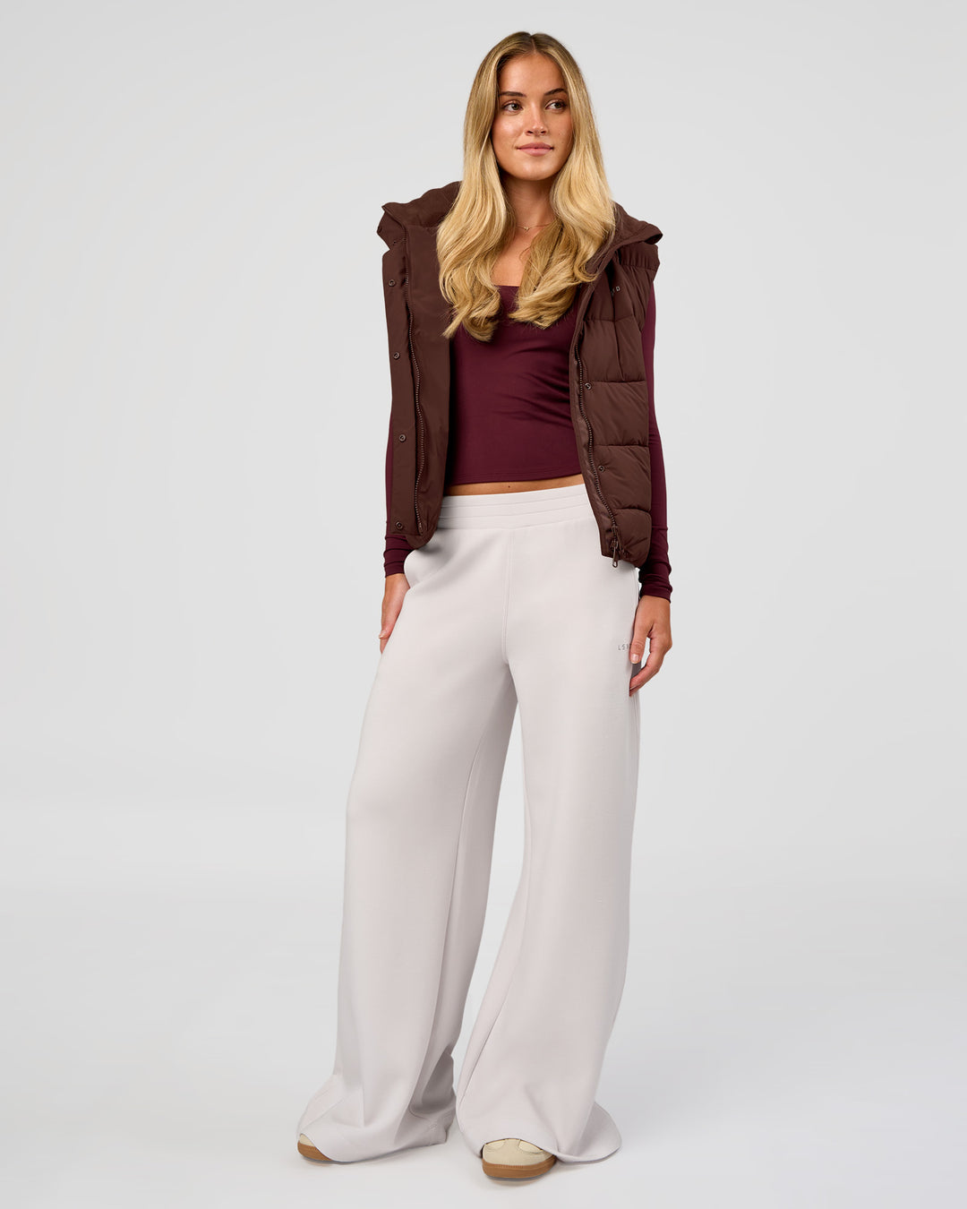 Woman wearing Go-To Puffer Vest - Hot Chocolate | Model:Issy | Size:XS - view 4