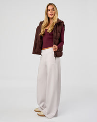 Woman wearing Go-To Puffer Vest - Hot Chocolate | Model:Issy | Size:XS | Thumbnail Index: 6