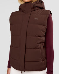 Woman wearing Go-To Puffer Vest - Hot Chocolate | Model:Issy | Size:XS | Thumbnail Index: 0