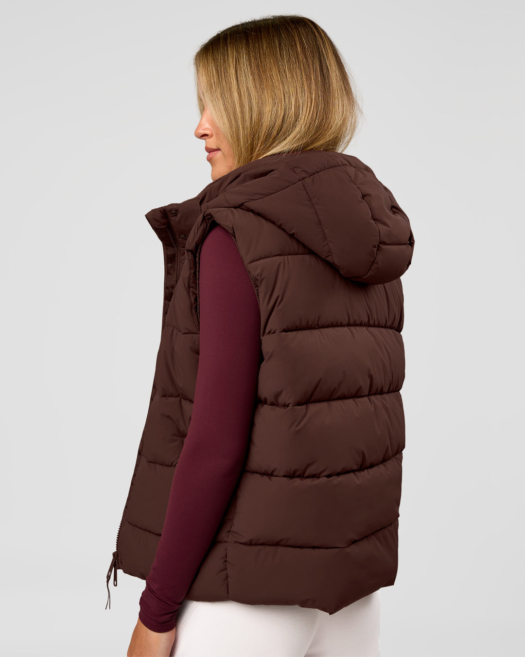 Woman wearing Go-To Puffer Vest - Hot Chocolate | Model:Issy | Size:XS - view 2