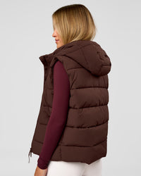 Woman wearing Go-To Puffer Vest - Hot Chocolate | Model:Issy | Size:XS | Thumbnail Index: 1