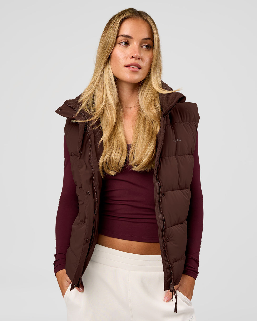 Woman wearing Go-To Puffer Vest - Hot Chocolate | Model:Issy | Size:XS - view 8