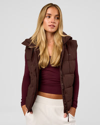 Woman wearing Go-To Puffer Vest - Hot Chocolate | Model:Issy | Size:XS | Thumbnail Index: 7