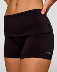 Woman wearing Groovy High Rise Fold Over 4" Short - Black | Model:Issy | Size:XS | Thumbnail Index: 0