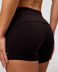 Woman wearing Groovy High Rise Fold Over 4" Short - Black | Model:Issy | Size:XS | Thumbnail Index: 5