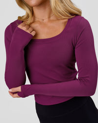 Woman wearing Horizon Long Sleeve Tee - Plum Caspia | Model:Issy | Size:XS | Thumbnail Index: 0