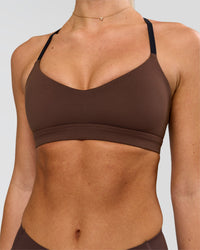 Woman wearing Infinity Sports Bra - Hot Chocolate | Model:Issy | Size:XS | Thumbnail Index: 0