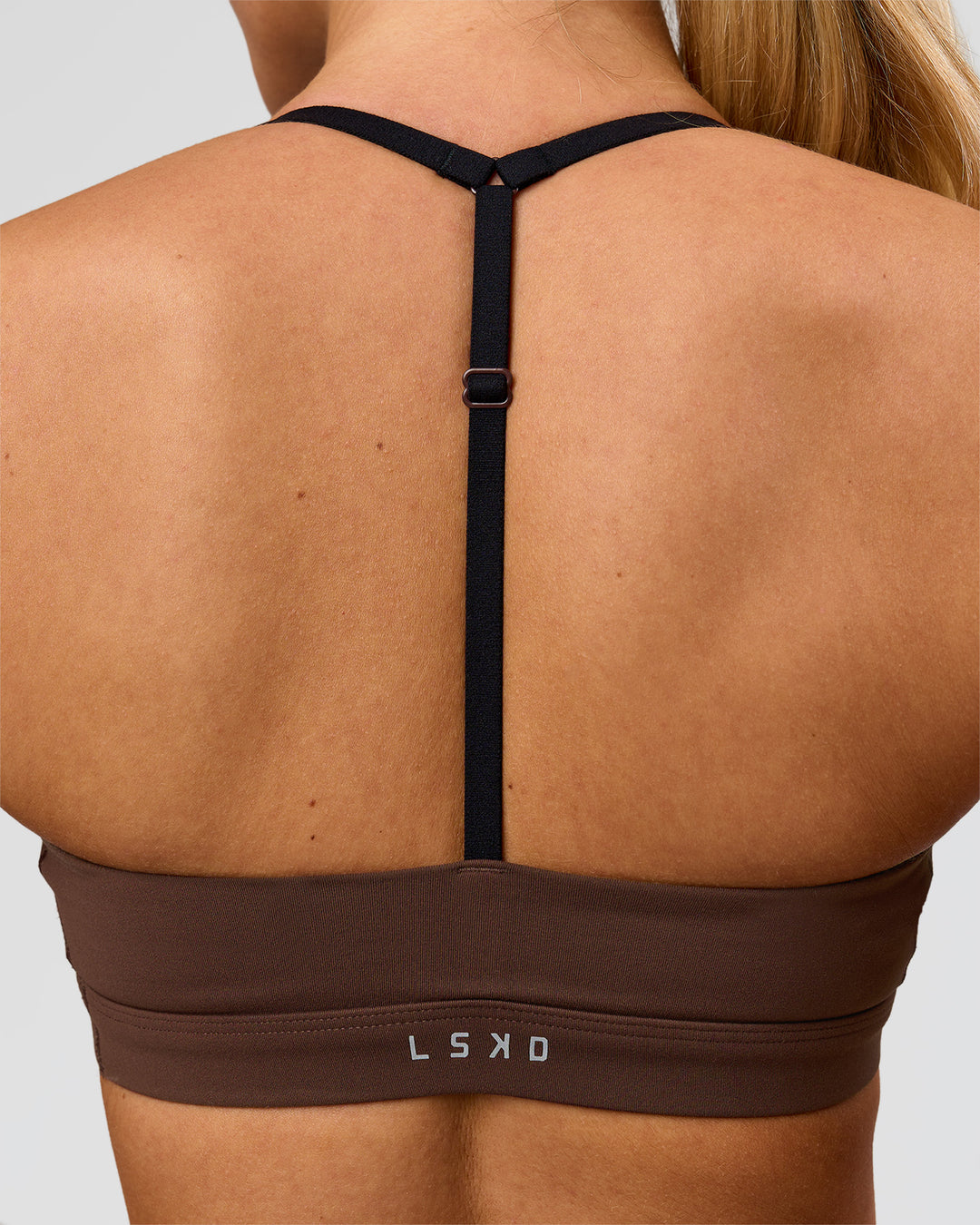 Woman wearing Infinity Sports Bra - Hot Chocolate | Model:Issy | Size:XS - view 2