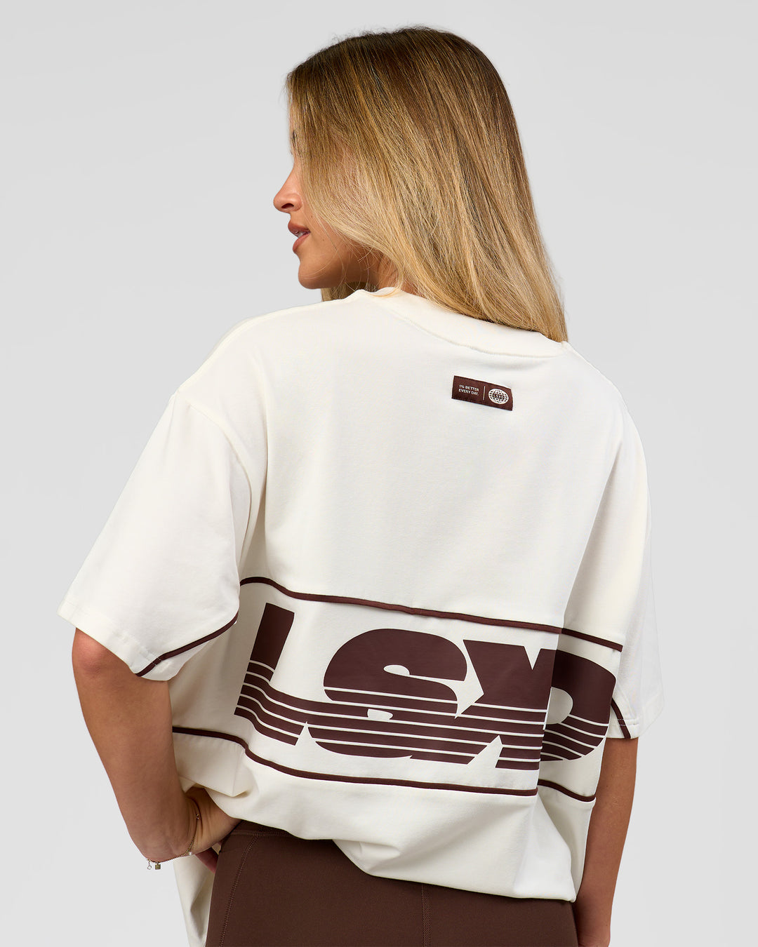 Woman wearing Inline Heavyweight FLXCotton Oversized Tee - Off White-Hot Chocolate | Model:Issy | Size:XS - view 10