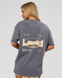 Woman wearing Magma FLXCotton Oversize Tee  - Dark Storm Washed-Lemon | Model:Issy | Size:XS | Thumbnail Index: 2