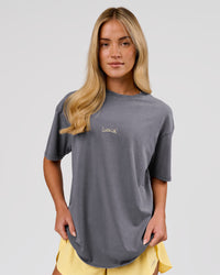 Woman wearing Magma FLXCotton Oversize Tee  - Dark Storm Washed-Lemon | Model:Issy | Size:XS | Thumbnail Index: 10