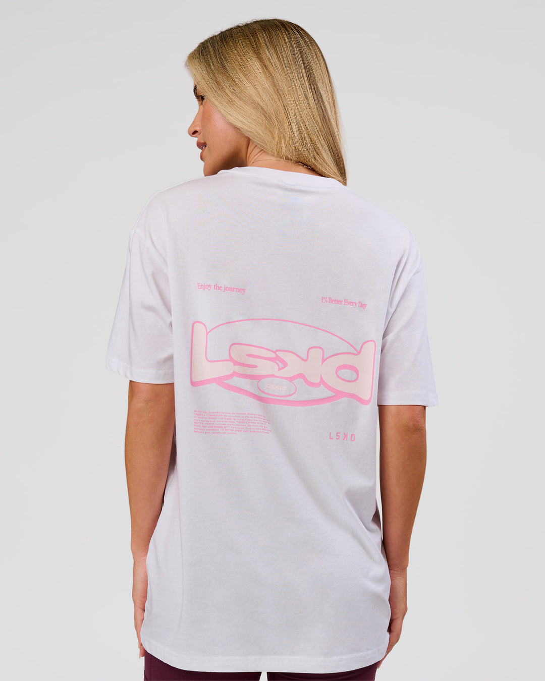 Woman wearing Magma FLXCotton Oversize Tee  - White-Pink Rose | Model:Issy | Size:XS - view 9