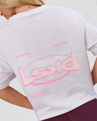 Woman wearing Magma FLXCotton Oversize Tee  - White-Pink Rose | Model:Issy | Size:XS | Thumbnail Index: 10