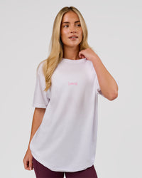 Woman wearing Magma FLXCotton Oversize Tee  - White-Pink Rose | Model:Issy | Size:XS | Thumbnail Index: 12