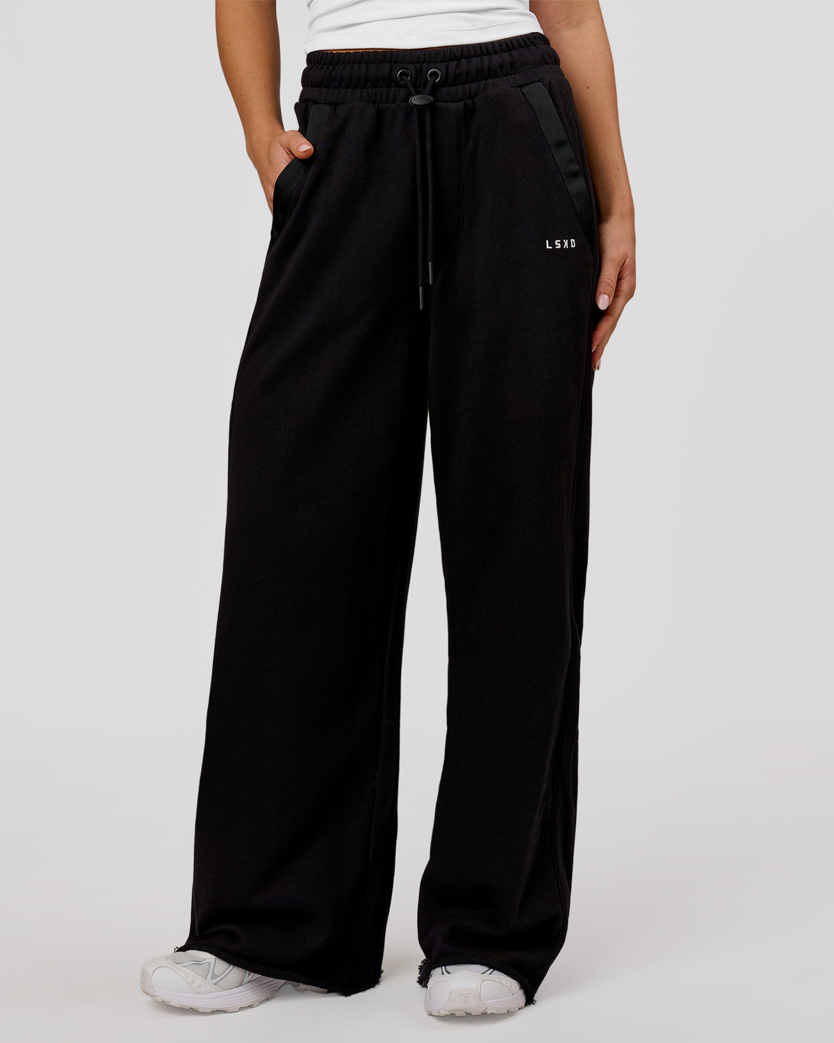 Woman wearing MVP Elite Terry Wide Leg Pant - Black-White | Model:Issy | Size:XS - view 1