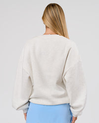 Woman wearing Playbook Boxy Crew Sweater - Silver Marl-Open Air | Model:Issy | Size:XS | Thumbnail Index: 1
