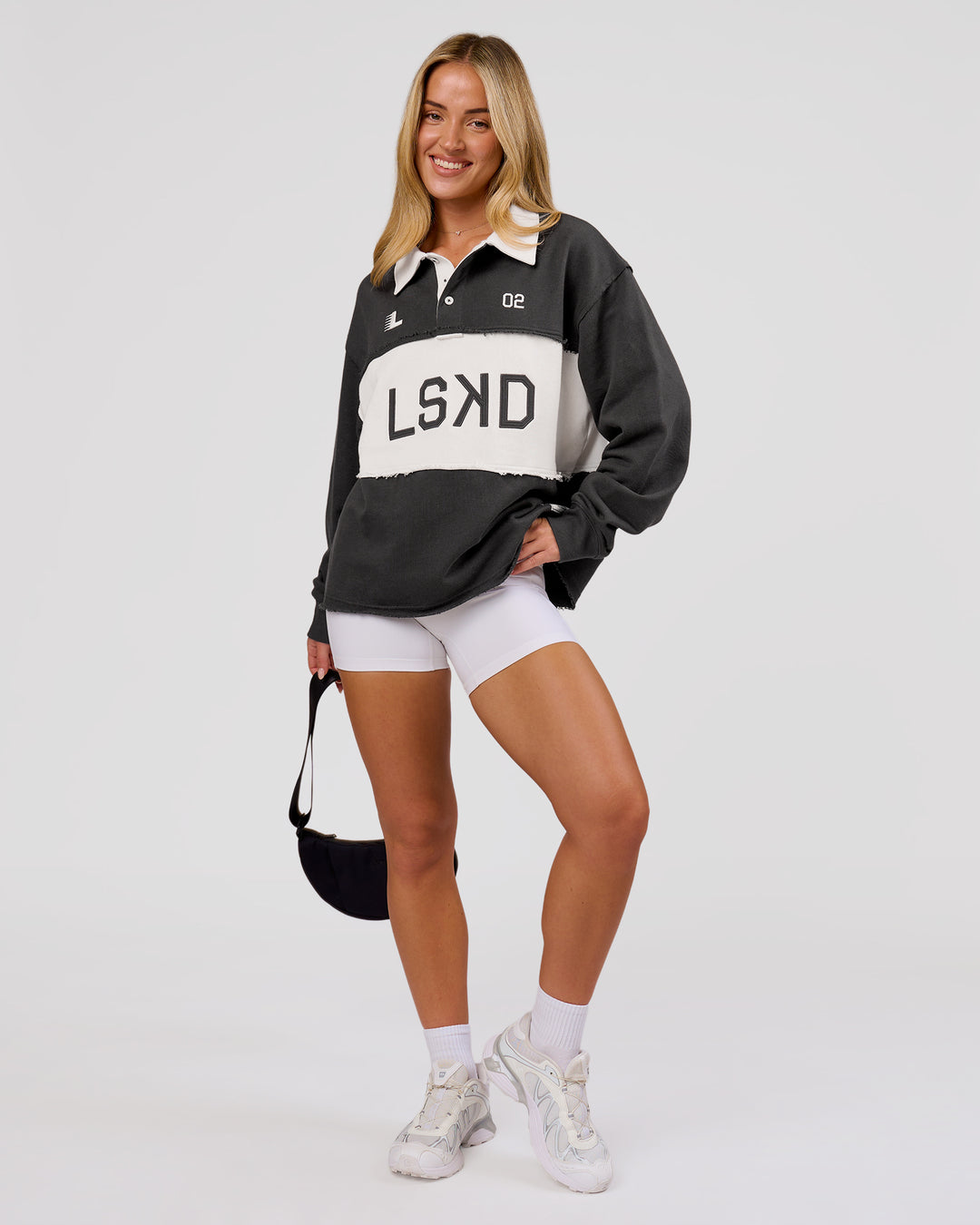 Woman wearing Playbook Unisex Collared Sweater - Onyx-Off White | Model:Issy | Size:XS - view 5