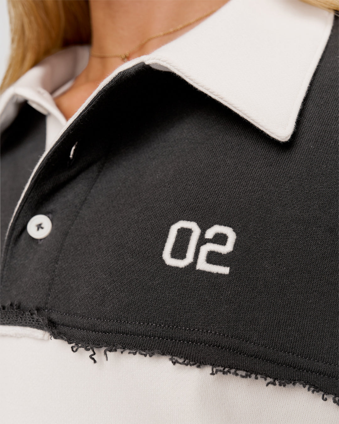 Woman wearing Playbook Unisex Collared Sweater - Onyx-Off White | Model:Issy | Size:XS - view 9