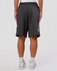 Woman wearing Playbook Varsity Fleece Shorts - Onyx-Off White | Model:Issy | Size:XS | Thumbnail Index: 15