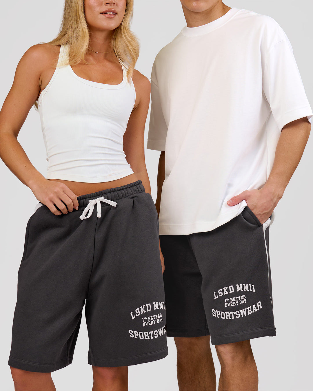 Woman wearing Playbook Varsity Fleece Shorts - Onyx-Off White | Model:Issy | Size:XS - view 21