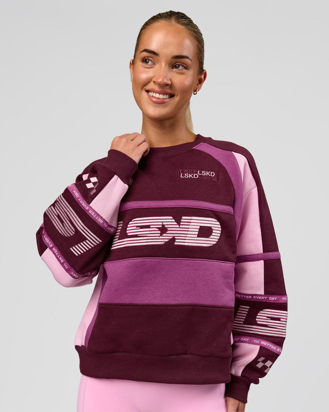 Woman wearing Power Sweater - Cherry Lacquer-Boysenberry | Model:Issy | Size:XS - view 1