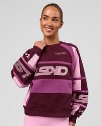 Woman wearing Power Sweater - Cherry Lacquer-Boysenberry | Model:Issy | Size:XS | Thumbnail Index: 0