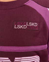 Woman wearing Power Sweater - Cherry Lacquer-Boysenberry | Model:Issy | Size:XS | Thumbnail Index: 6