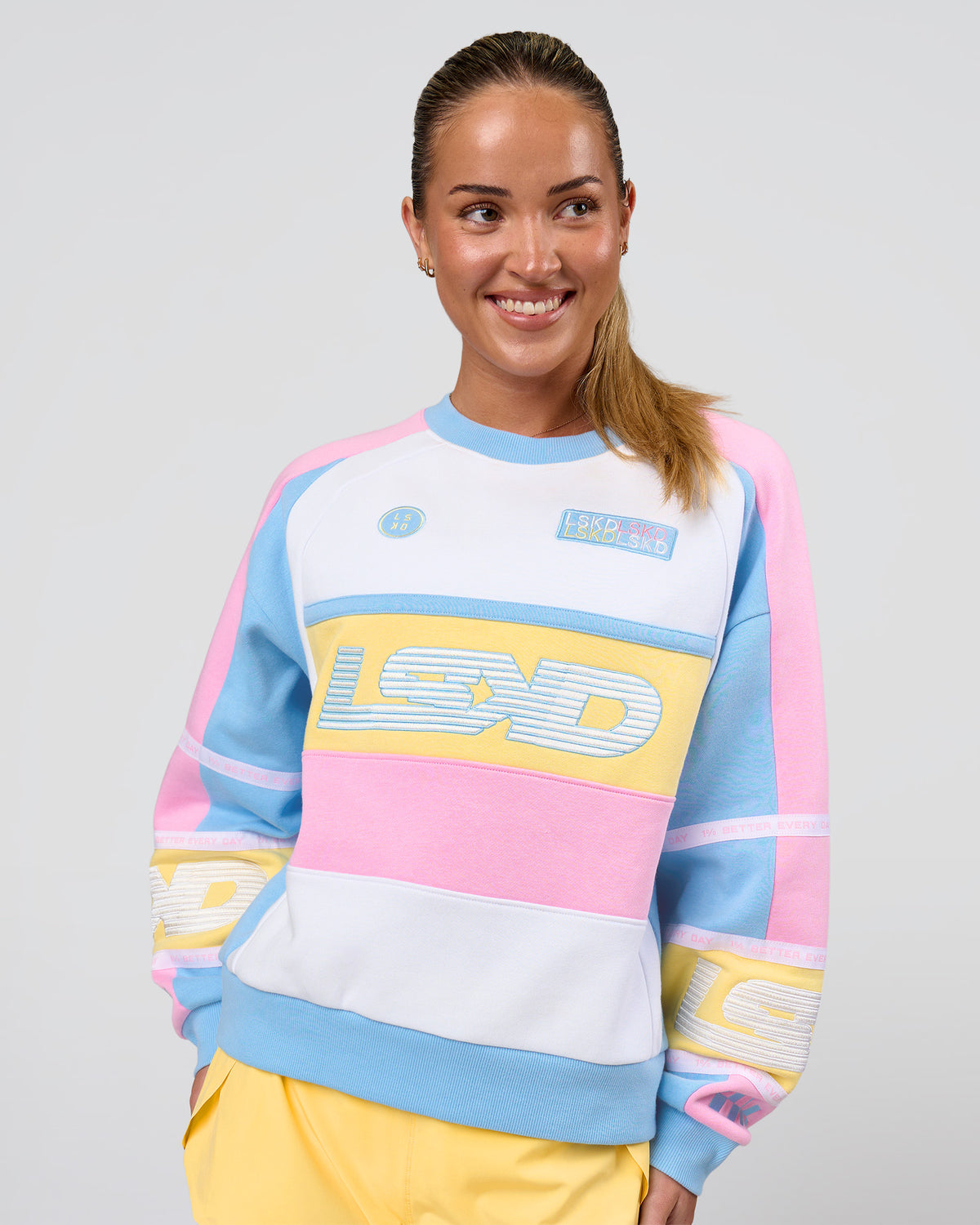 Woman wearing Power Sweater - Pink Rose-Lemon | Model:Issy | Size:XS