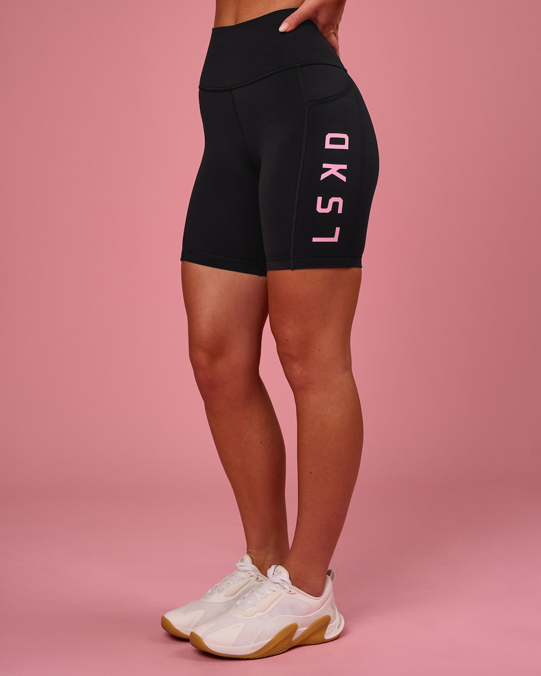 Woman wearing Rep Ultra High-Rise 6" Short Pockets - Black-Pink Rose | Model:Issy | Size:XS - view 8